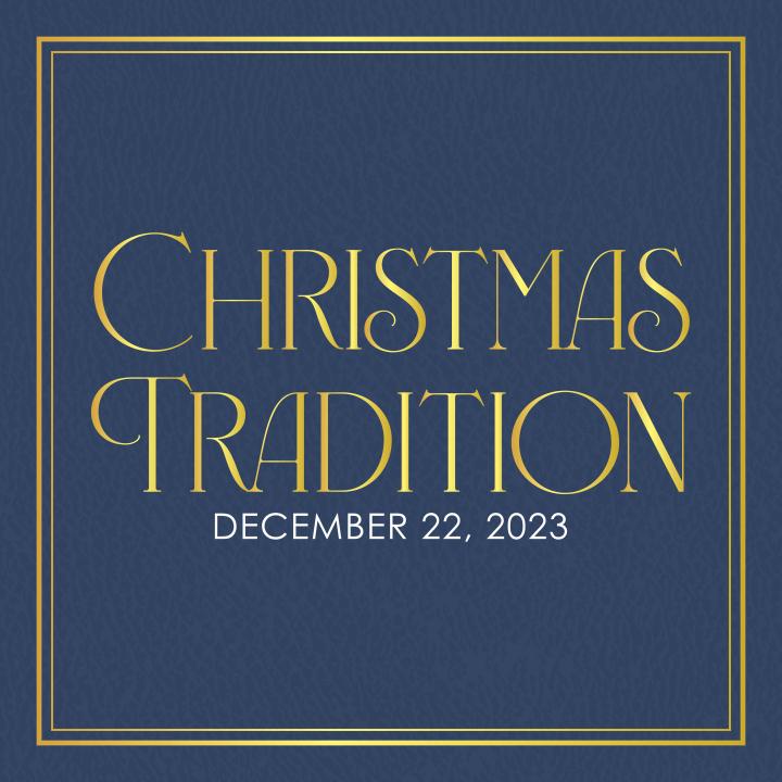 navy leather book cover with christmas tradition written across in gold