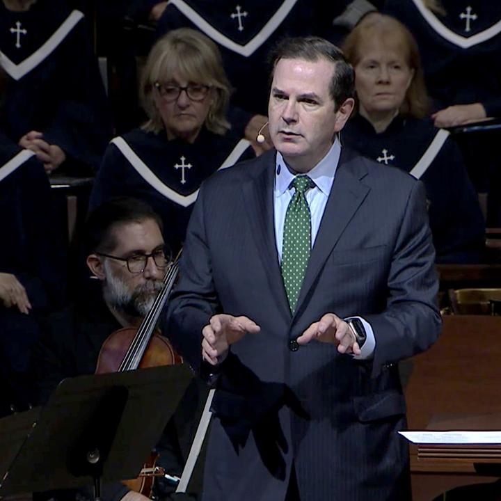 Steve Wells addressing the congregation during worship