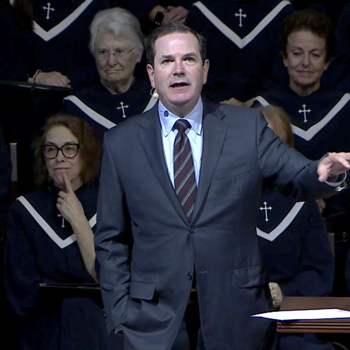 Steve Wells addressing the congregation during worship