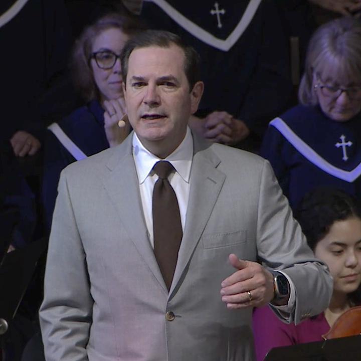 Steve Wells addressing the congregation during worship