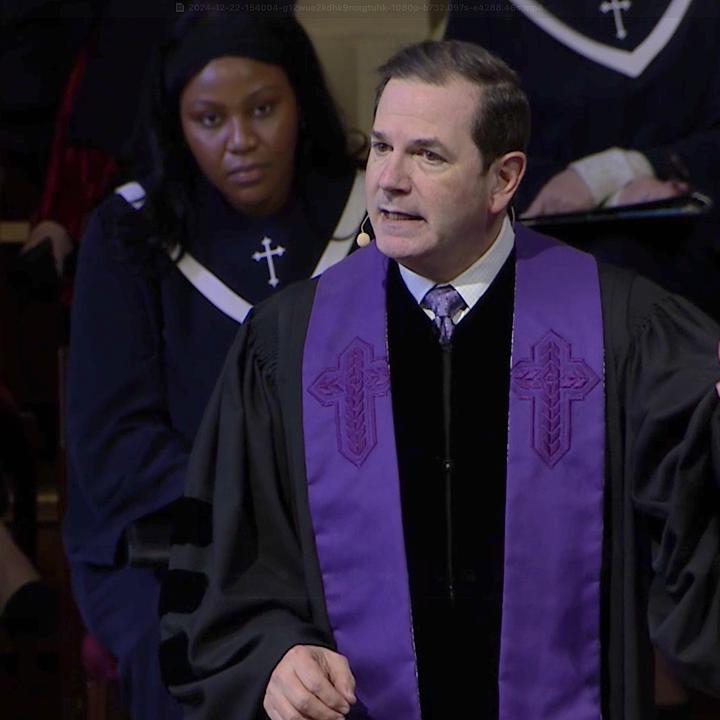 Steve Wells addressing the congregation during worship