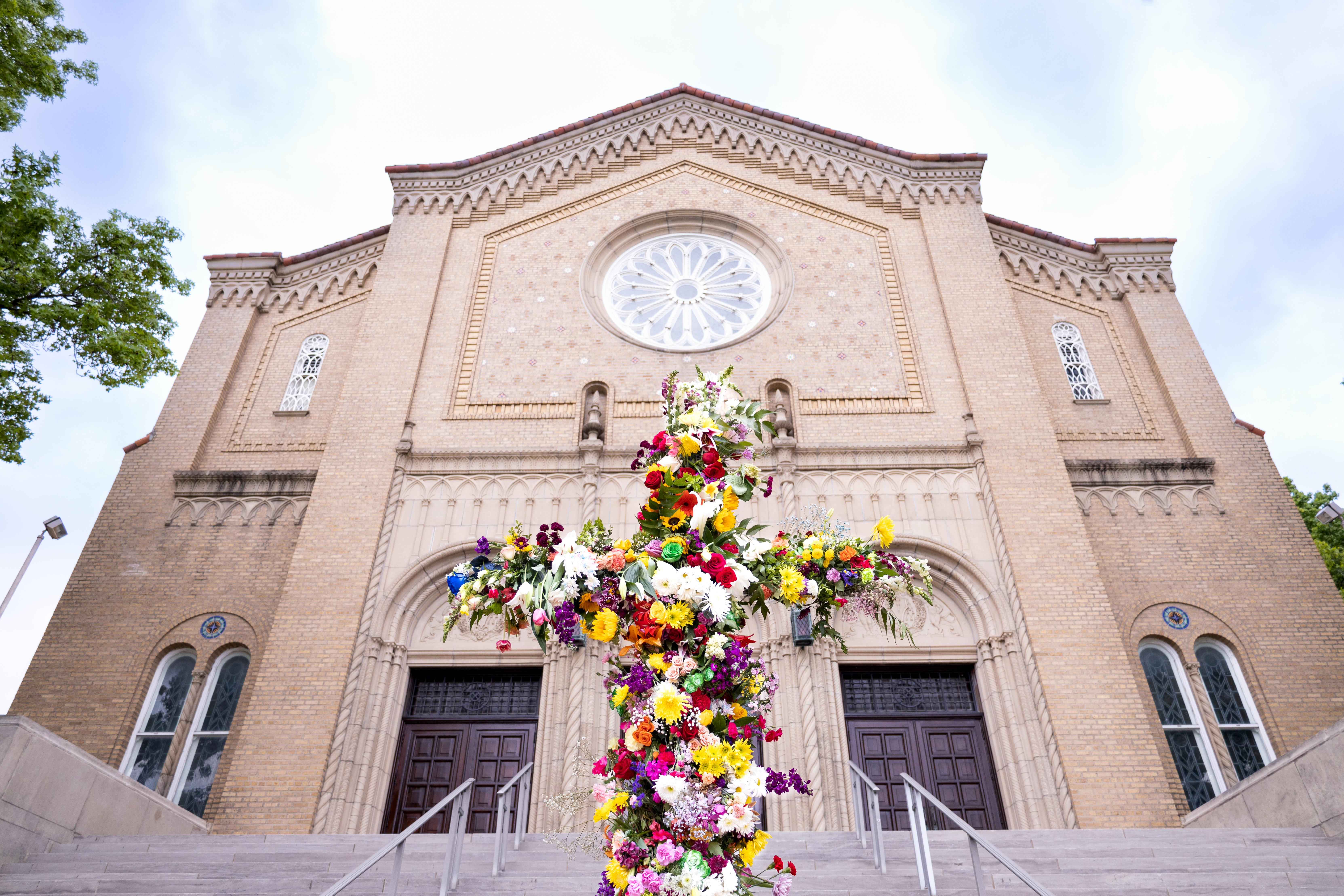 cross made of flowers in front of the south main sanctuary