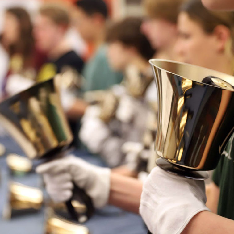 Close up of handbells ringing in rehearsal