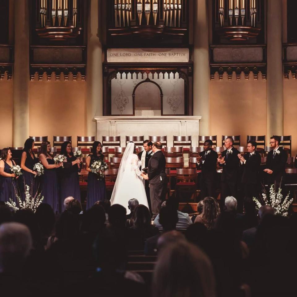 Wide shot of traditional wedding in SMBC sanctuary 